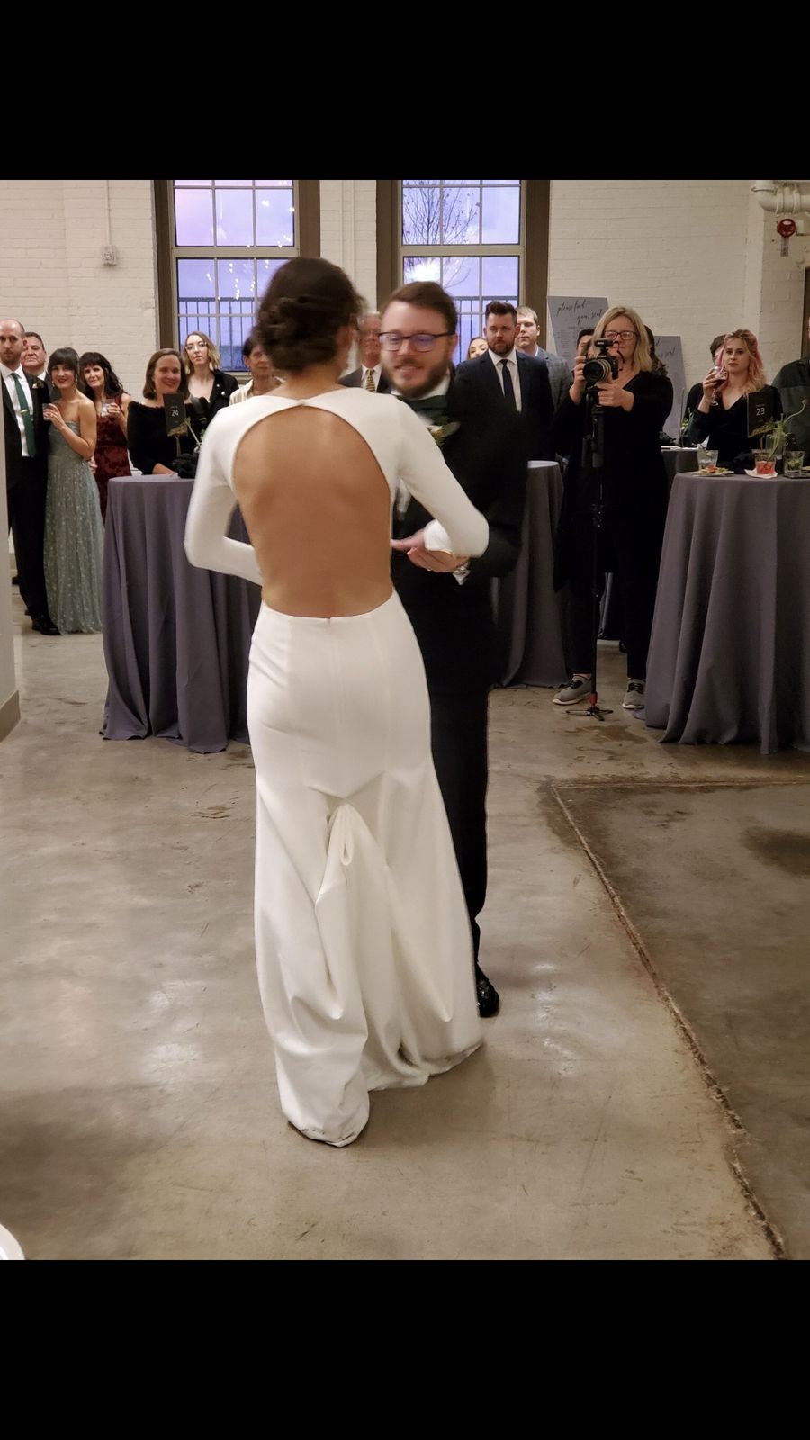 Bride at her reception with a Soleil bridal airbrush tan
